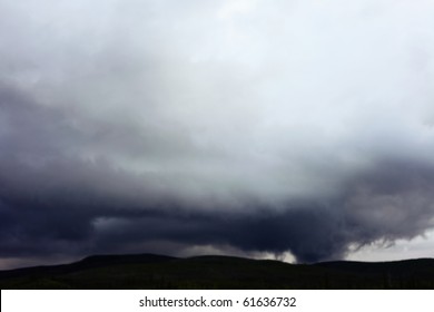 Dark clouds brewing before rain.