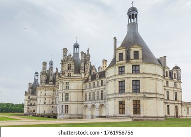 Dark Clouds And Dramatic Scene Over Chateau Chambord .

Castle With Very Distinctive French Renaissance Architecture