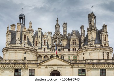 Dark Clouds And Dramatic Scene Over Chateau Chambord .

Castle With Very Distinctive French Renaissance Architecture