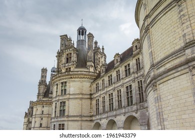 Dark Clouds And Dramatic Scene Over Chateau Chambord .

Castle With Very Distinctive French Renaissance Architecture