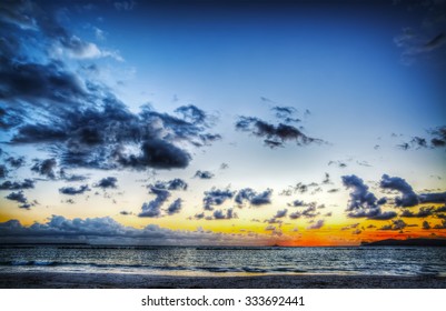 dark clouds in a dramatic sky at sunset