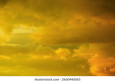 Dark clouds, golden sunset, dramatic sky, red-roofed buildings, silhouette, stormy atmosphere, moody lighting, evening, architectural contrast, heavy clouds, intense color, low horizon.