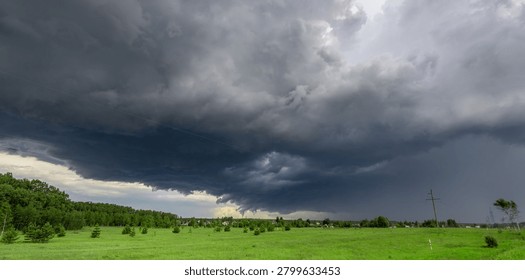Dark clouds loom over open green fields. Lightning flashes beneath a stormy, heavy sky. Trees line the horizon under swirling, ominous skies. Far off, faint streaks suggest distant lightning