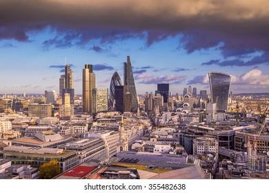 Dark clouds over London's business district at sunset - Panoramic skyline of London - UK
