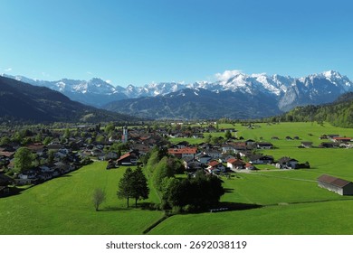 Dark clouds over lush springtime valley