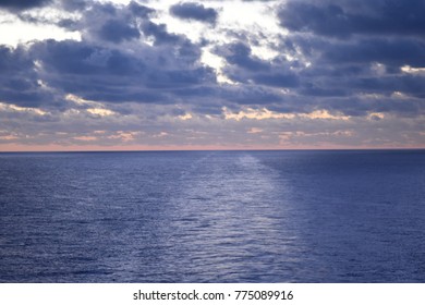 Dark Clouds Over The Ocean