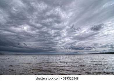 Dark Cloudy Sky On The Volga River