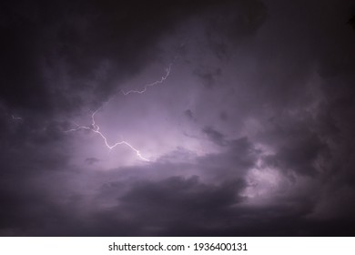 A Dark Cloudy Sky With Thunder Lightning Bolt Strike