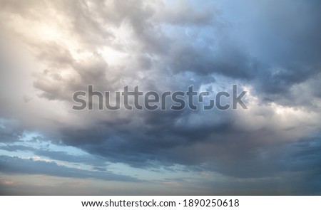 Dark cloudy sunset skies, full frame background