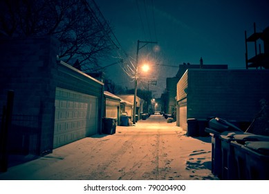 Dark, Cold Chicago Winter Alley With Snow And Ice At Night.