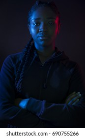 Dark Colorful Portrait Of Confident African Woman With Dark Skin