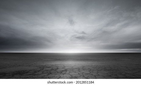 Dark Concrete Floor Background and Dramatic Gray Sky Clouds Horizon - Shutterstock ID 2012851184