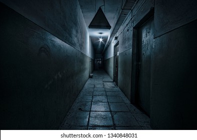 Dark corridor. Mystical interior of dark empty corridor, tunnel in an abandoned house. Dark mysterious corridor. The interior of an abandoned house, road to hell. An old abandoned building - Powered by Shutterstock