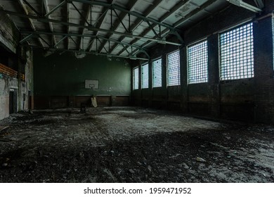 Dark Creepy Ruined Gymnasium In Abandoned School.