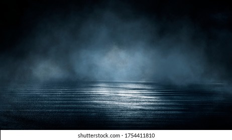 Dark Dramatic Abstract Scene Background. Neon Glow Reflected On The Pavement. Smoke, Smog And Fog. Dark Street, Wet Asphalt, Reflections Of Rays In The Water. Abstract Dark Blue Background. 