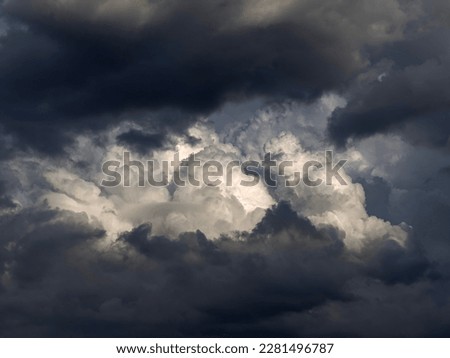 Dark and dramatic background of storm clouds area.