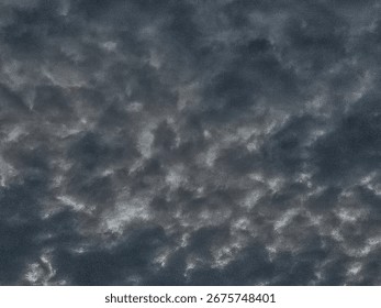 Dark dramatic clouds forming in the evening sky, creating a moody and textured atmosphere. Suitable for use in backgrounds, weather forecasts, storm themes, and abstract designs.