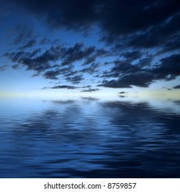 Dark dramatic clouds over water
