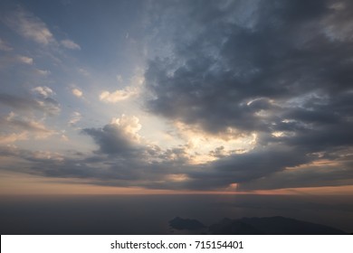 dark dramatic clouds at sunset
