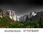 Dark dramatic depiction of Yosemite National Park at iconic Valley View with El Captain 