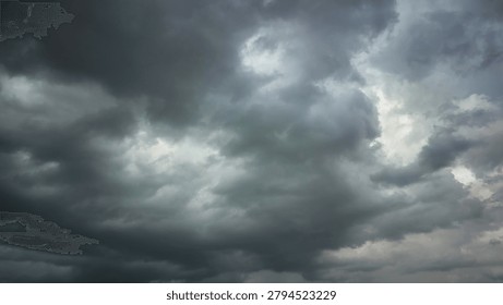 Dark and dramatic storm clouds gathering in the sky before the heavy rain.
