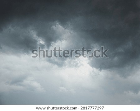 Dark and dramatic storm clouds heralding imminent rain
