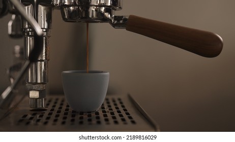 Dark Early Morning Shot Of Rinsing Coffee Machine Before Making Esprresso, Wide Photo