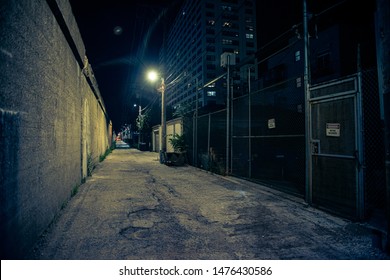 Dark And Eerie Urban City Alley At Night 