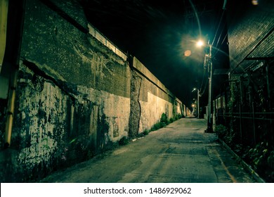 Dark And Eerie Urban City Alley At Night