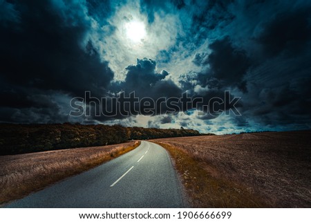 Similar – Image, Stock Photo Country road in darkness with family house and passing car