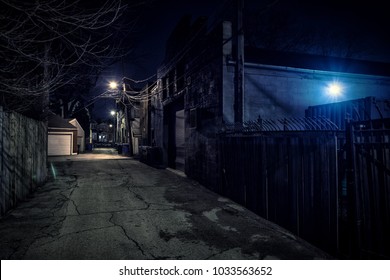 Dark Empty Scary Urban City Street Alley With Vintage Buildings At Night