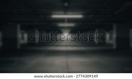 A dark and empty underground parking garage with dim lighting, creating a sense of mystery and anticipation. The concrete structure and overhead lights add to the industrial aesthetic.