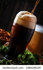 Dark English Beer, Ale Or Stout Is Poured Into Glass, Dark Bar Counter, Space For Text, Selective Focus