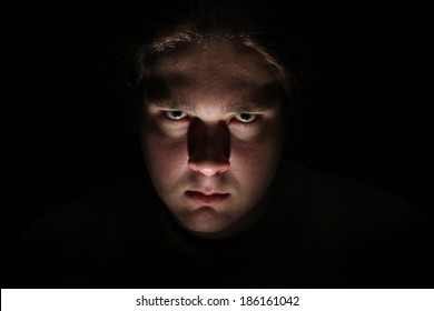 Dark Evil Face On Black Background