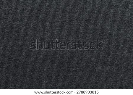 Dark fabric texture in close up