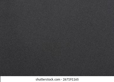 Dark fabric texture. Clothes background