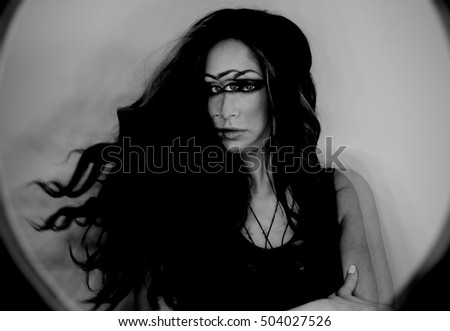 Dark fantasy portrait of magician woman, third eye, witch concept
