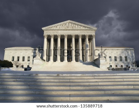 Dark forbidding troubled storm sky over the United States Supreme Court building in Washington DC.