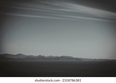 A dark and forboding looking coastline.