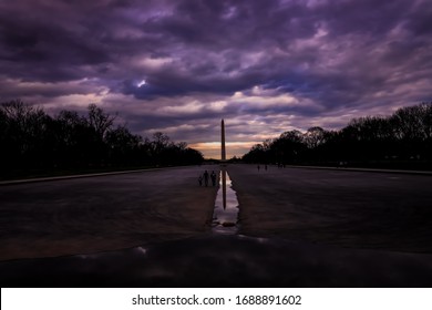 Dark and foreboding clouds over the Washington and Lincoln Monuments in the Nation's Capital. - Shutterstock ID 1688891602