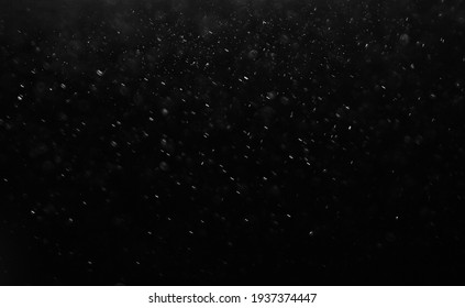 Dark glitter colorful  lights background. light in black background. Dust  in the space. hole in the wall. - Shutterstock ID 1937374447