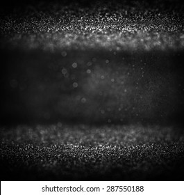 Dark Glitter Vintage Lights Background. Light Silver And Black. Defocused. 