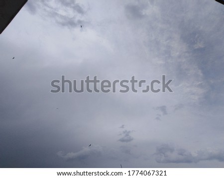 Dark Gloomy Clouds high up in the sky