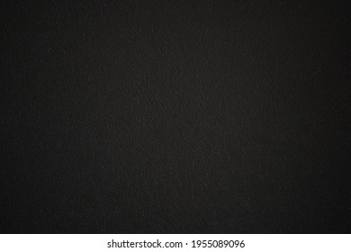 dark gray background of patterned walls