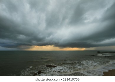 Dark gray and black clouds with some interesting light.