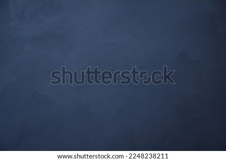 Dark Gray Blue Venetian decorative plaster Wall Background. Abstract Stucco Texture With Copy Space for design. Beautiful Wall decor, renovation 