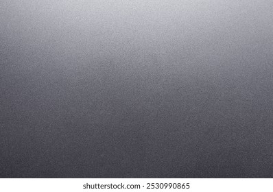 Dark gray silver background, featuring a rough, grungy grain texture. shiny silver foil abstract background for design.
