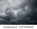 Dark gray sky cloudy environment. Meteorology danger windstorm disasters climate. Dramatic dark storm rain clouds black sky background. Dark cloudscape storm disaster gloomy gray cloud sky. Nimbus