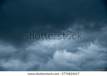 Dark gray sky cloudy environment. Meteorology danger windstorm disasters climate. Dramatic dark storm rain clouds black sky background. Dark cloudscape storm disaster gloomy gray cloud sky. Nimbus