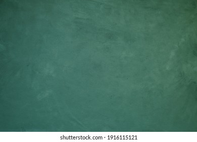 Dark green artistic canvas backdrop. Abstract vintage texture.